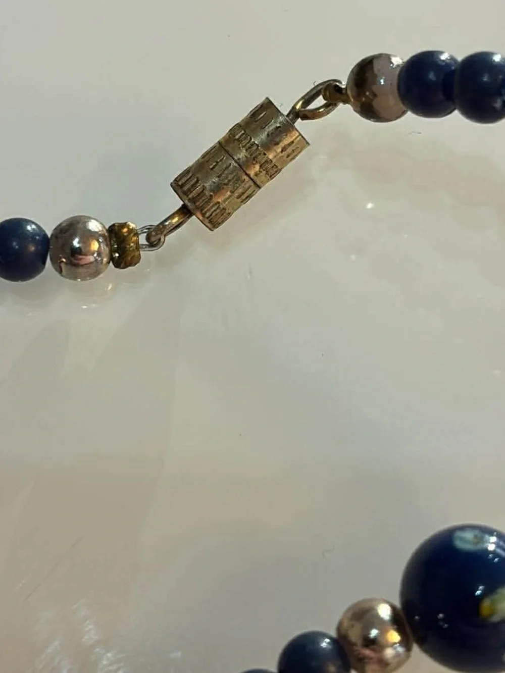 Handcrafted Navy Blue Beaded Bracelet with floral Accents